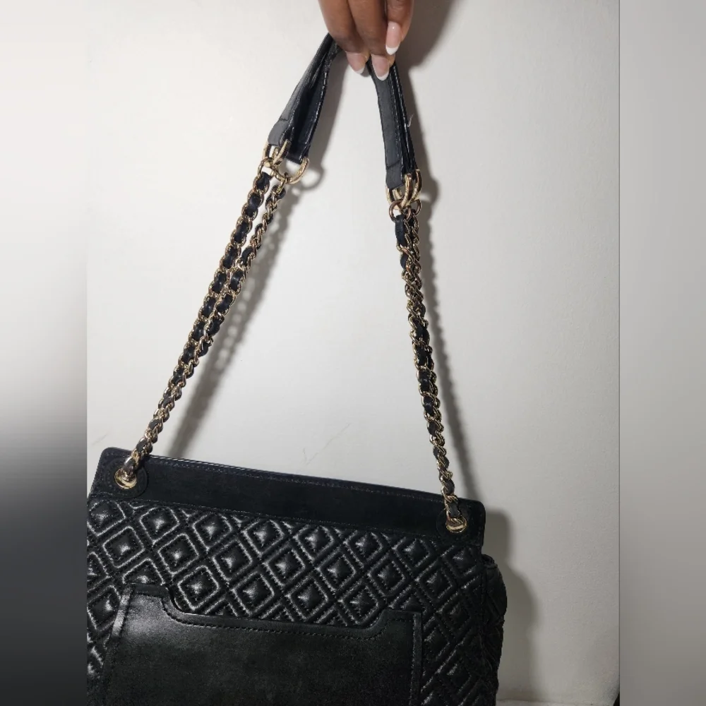 Tory Burch reposhing this